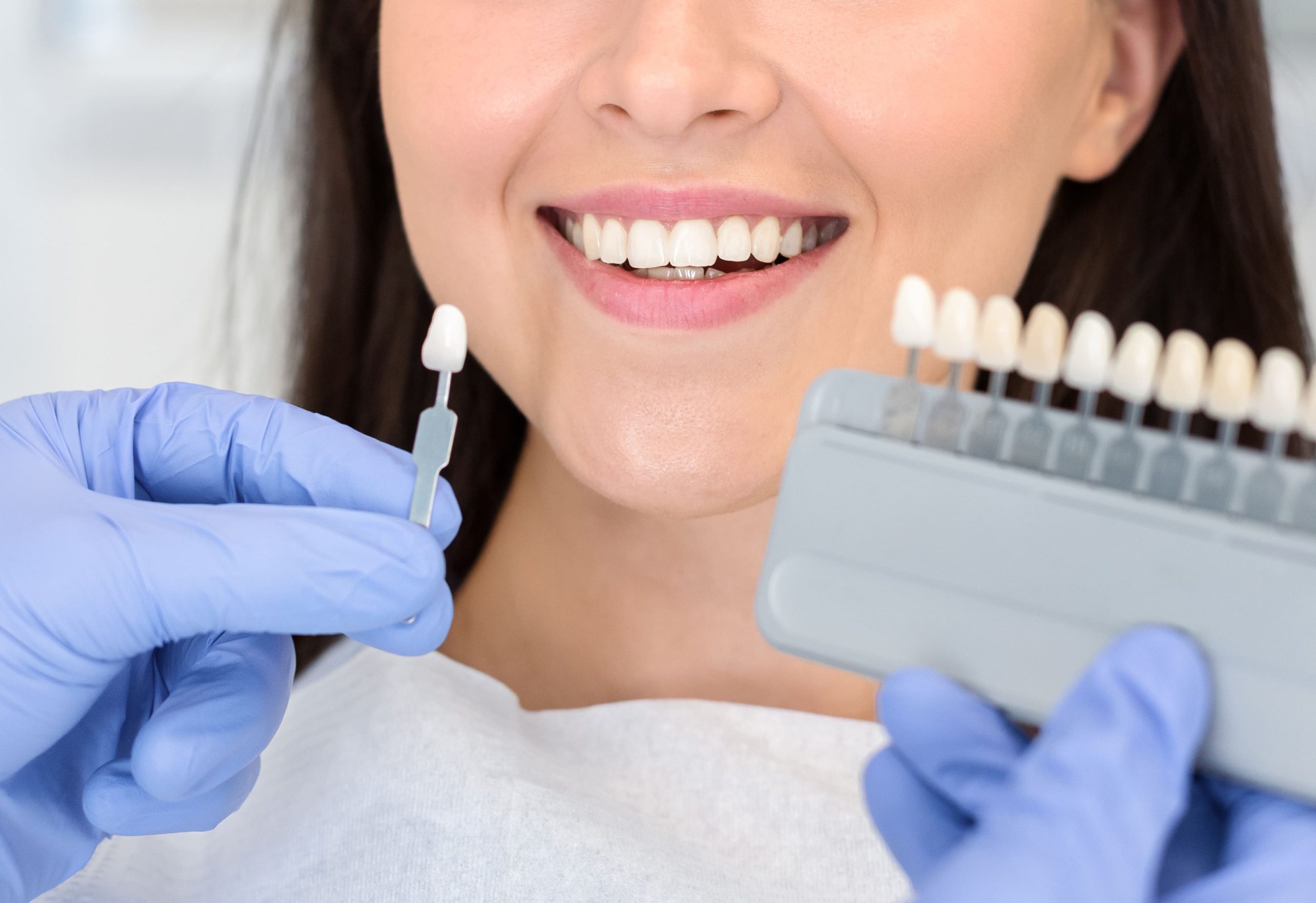dentist-applying-sample-from-tooth-scale-to-happy-2023-11-27-05-18-10-utc (1)
